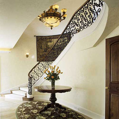 Main Stair Hall with custom wrought iron railing