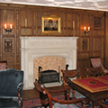 Collegiate gothic English Brown Oak Library interior by Felhandler Steeneken Architects