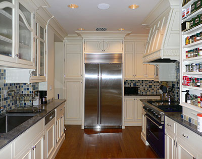 Kitchen with handmade tile mosaic splash