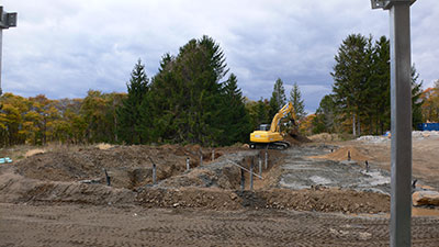 Well field with well casings and coolant tubing in place