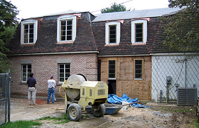 Ludowici roof tile salvaged from a midwestern church and used to match into existing roof at right